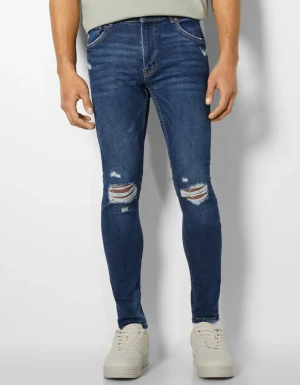 Jeans super skinny rotos-BERSHKA Outlet